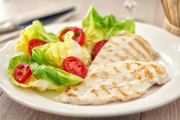 Grilled chicken with salad