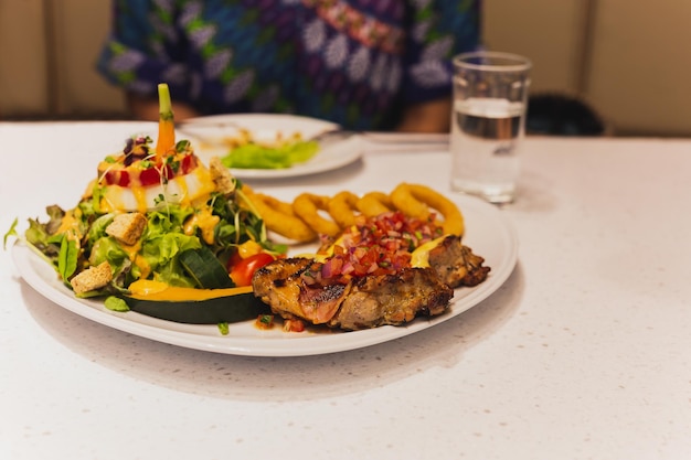 Grilled chicken with vegetables salad on a plate Healthy Food