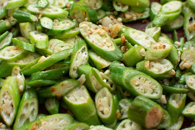 Grilled Chopped Okra in Red Frying Pan