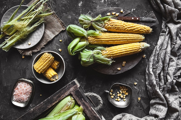 Grilled corn cobs with sauce, coriander