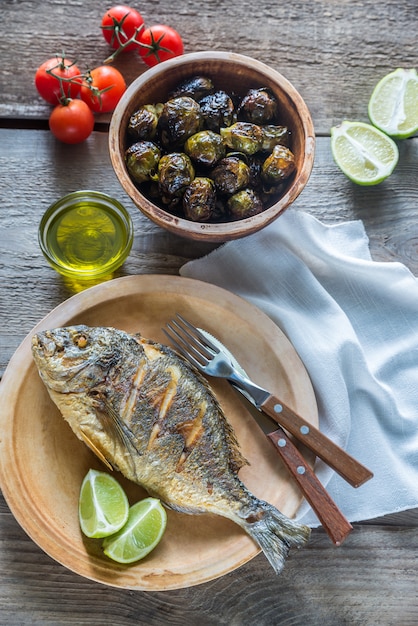 Grilled Dorade Royale Fish with fresh and baked vegetables