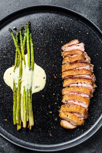 Grilled Duck fillet steaks with asparagus