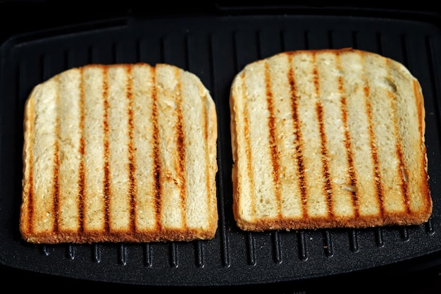 Grilled fried toasts on the grill