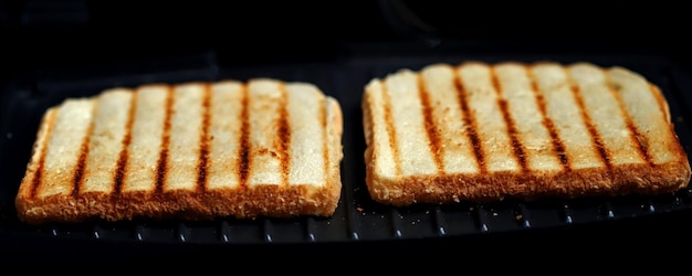 Grilled fried toasts on the grill