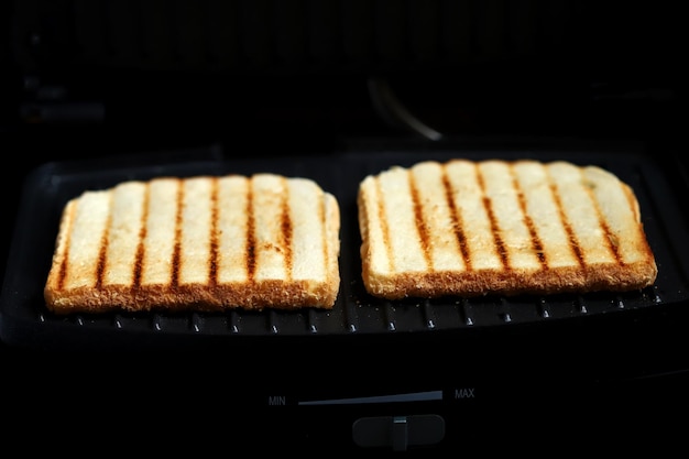 Grilled fried toasts on the grill