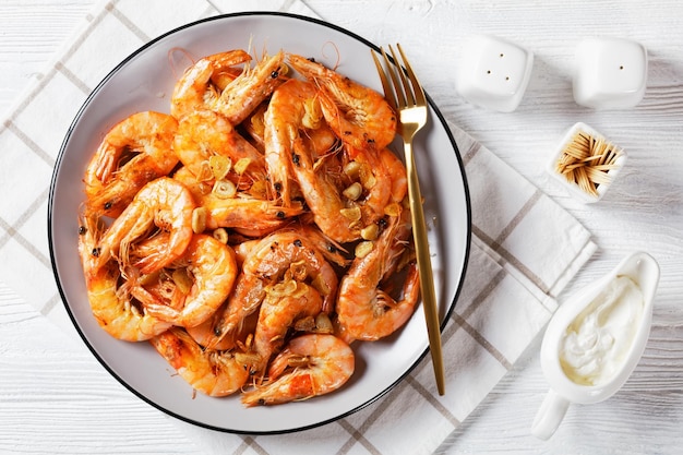 Grilled garlic butter prawns on a plate