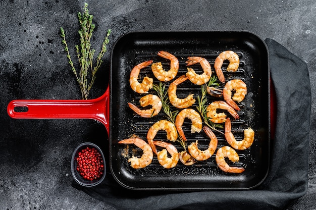 Grilled giant prawns, shrimps in a pan.  