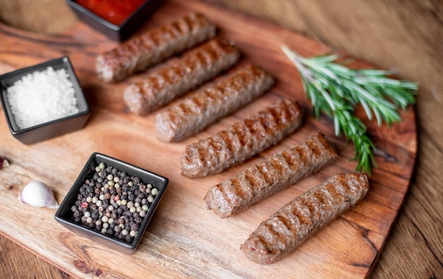 Grilled kebab with spices on a rustic background