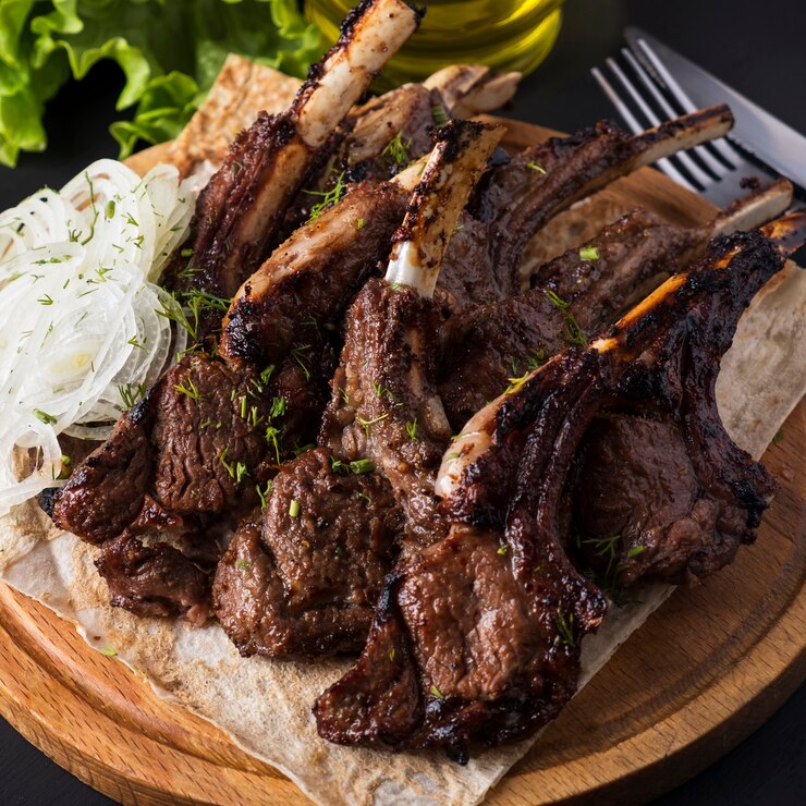 Photo grilled lamb meat.  fried edges of a lamb. sashlik. closeup