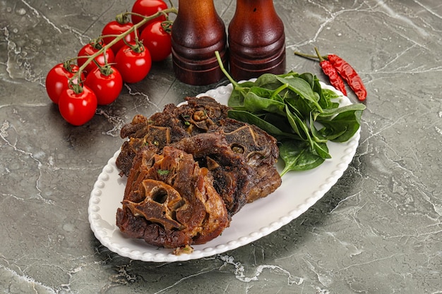 Grilled Lamb neck with spices and spinach