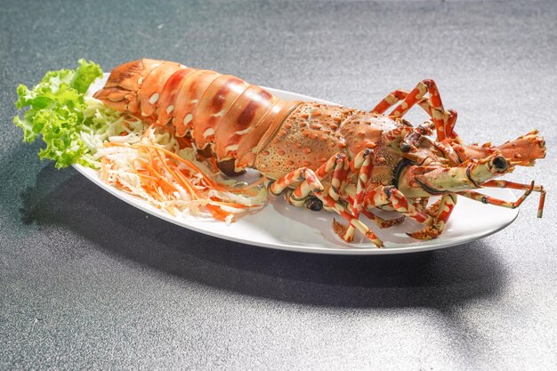 Grilled lobster and salad on a plate