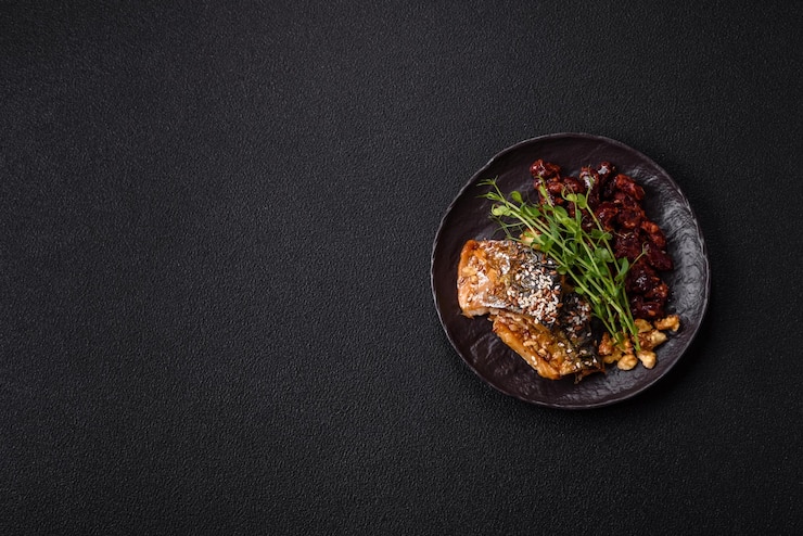 Photo grilled mackerel fillet pieces with vegetables salt and spices