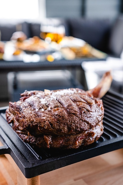 Grilled meat served with wine in bar