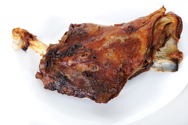 Grilled meat shoulder on plate