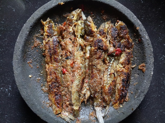 Photo grilled mudskipper fish sour and spicy seasoning