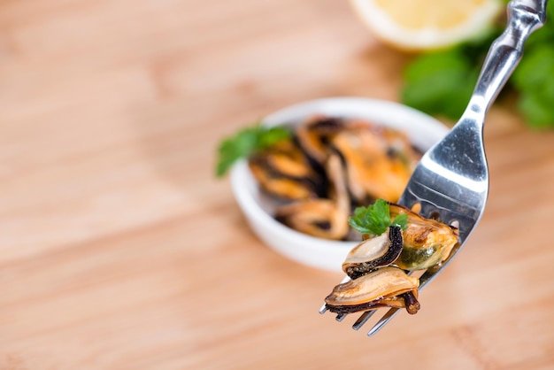 Grilled Mussels pickled in oil