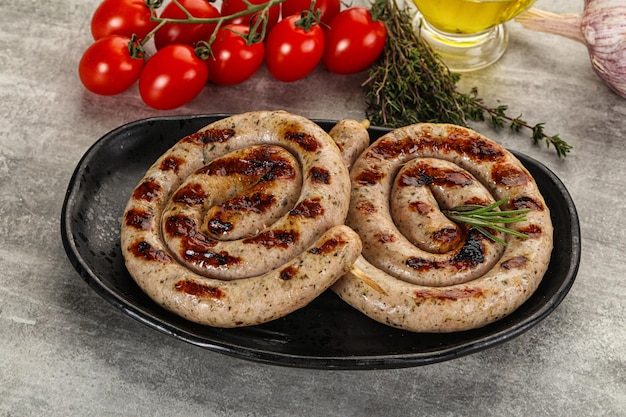 Grilled natural spiral meat sausage