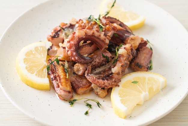 grilled octopus or squid with butter lemon sauce and thyme