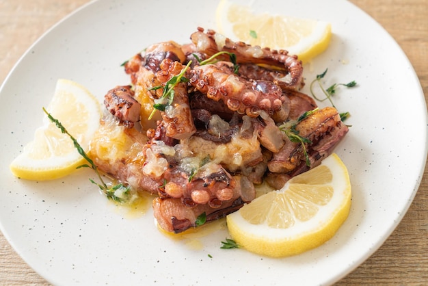 Grilled octopus or squid with butter lemon sauce