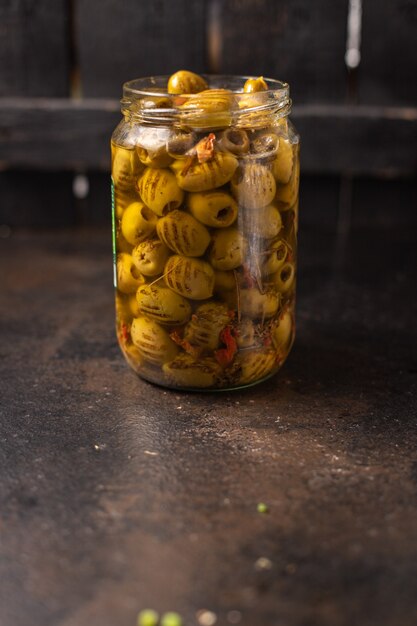 grilled olives fresh fruits in a plate ready to eat portion meal snack on the table copy space food