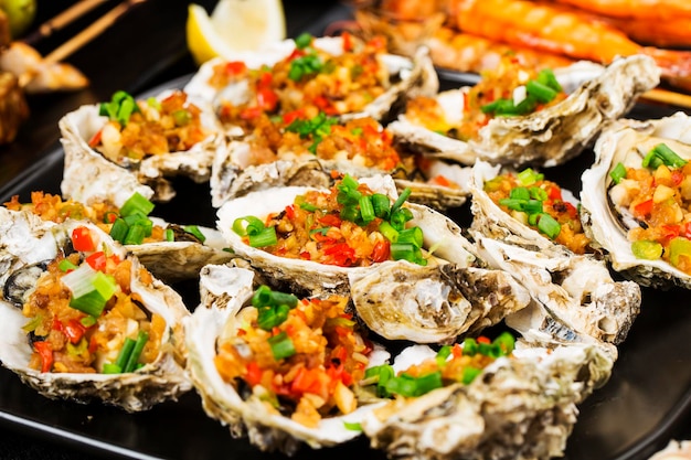 Grilled oysters with lemon garlic