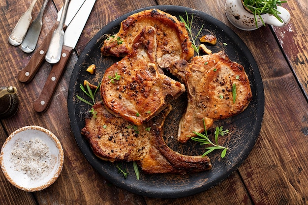 Grilled or pan fried pork chops on the bone