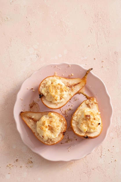 Grilled pears baked with ricotta cheese and walnuts honey topping