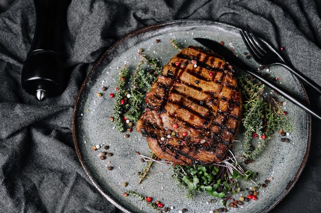 Grilled pork chop dish with spices on a plate