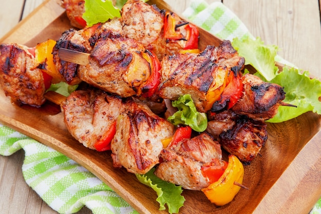 Grilled pork kebab with red and yellow pepper