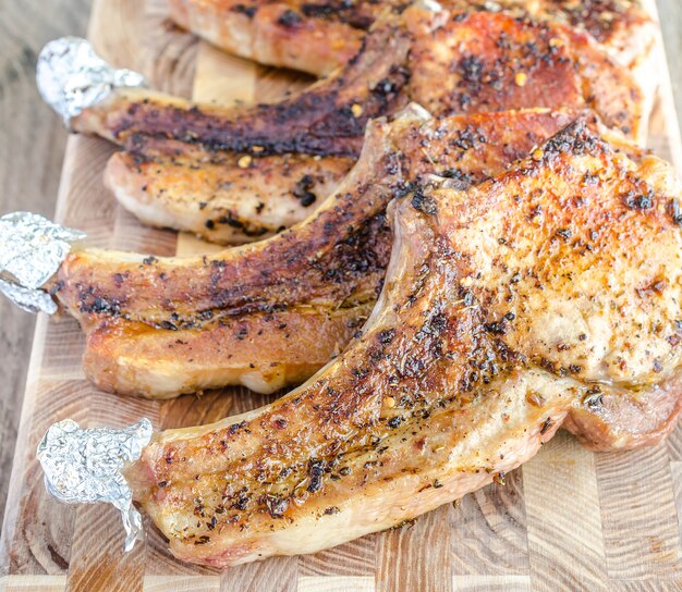 Grilled pork ribs on cutting board