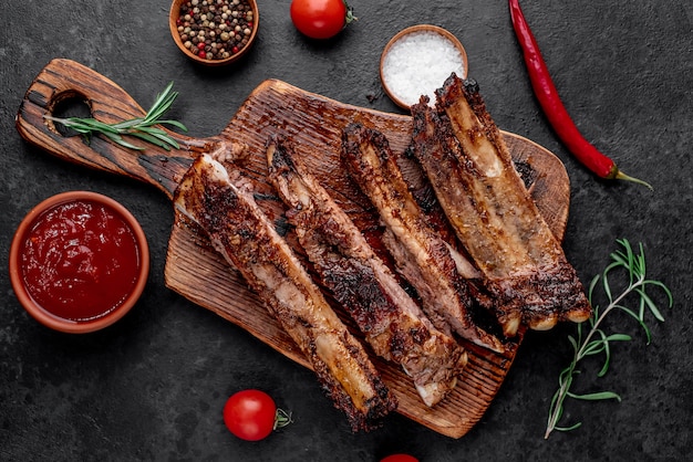 grilled pork ribs on a stone background