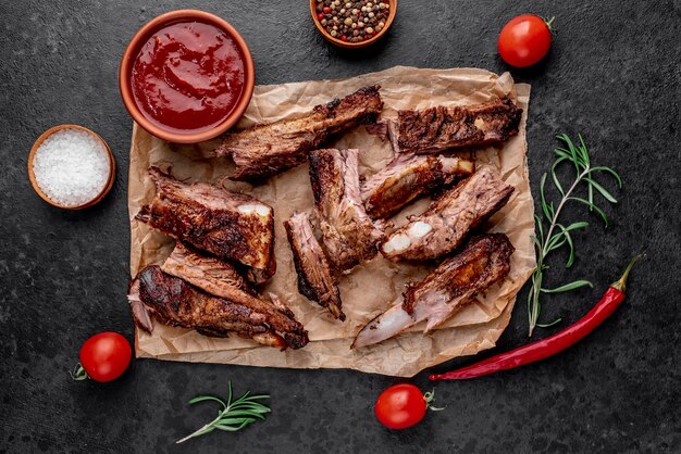 grilled pork ribs on a stone background