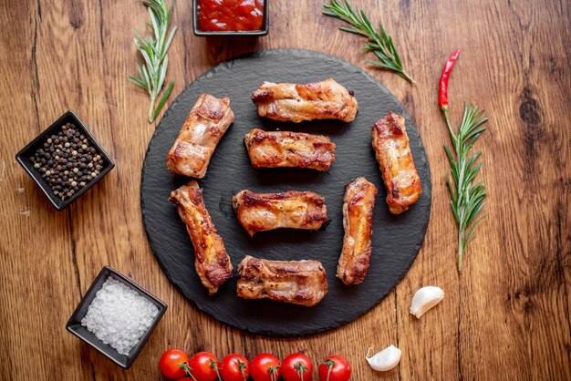 grilled pork ribs on wooden background