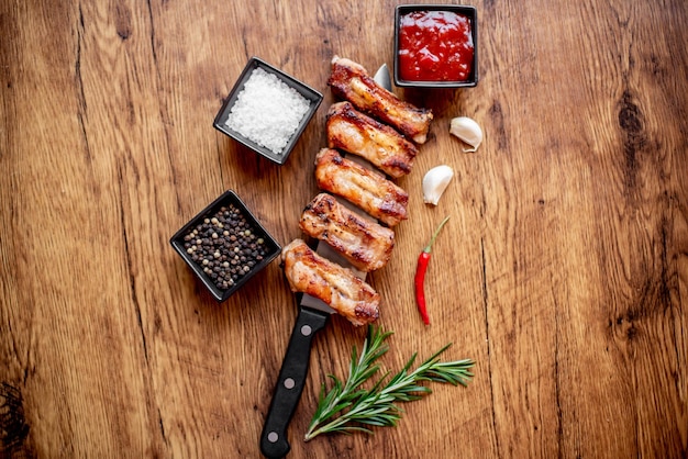 grilled pork ribs on wooden background