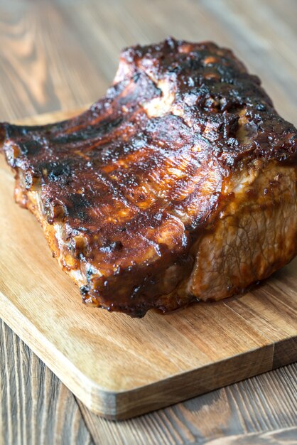 Grilled pork ribs on the wooden board