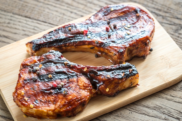 Grilled pork ribs on the wooden board