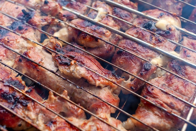 Photo grilled pork skewer on the grill