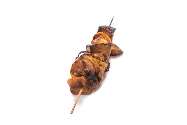 Grilled pork skewer isolated on white background