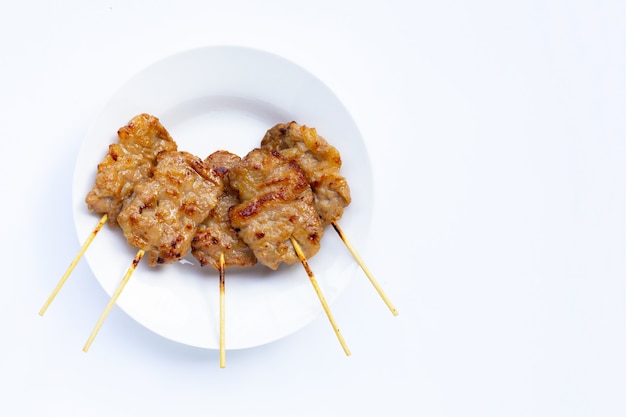 Grilled pork on white background.