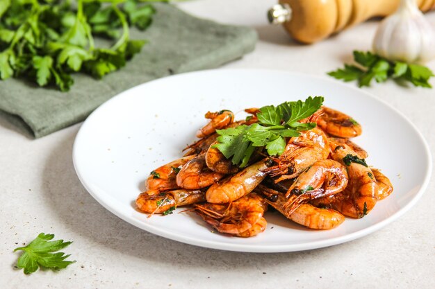 Grilled prawns on the white plate