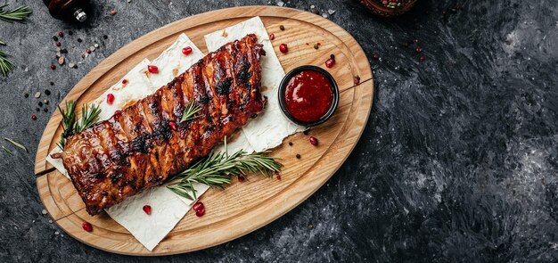 Grilled ribs on cutting board restaurant menu dieting cookbook
recipe long banner format top view