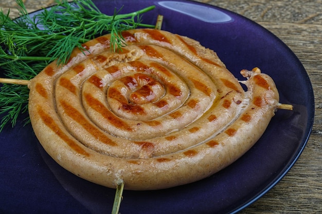 Photo grilled round sausage