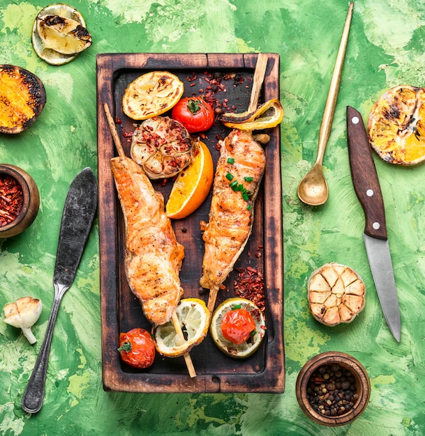 Grilled salmon on cutting board