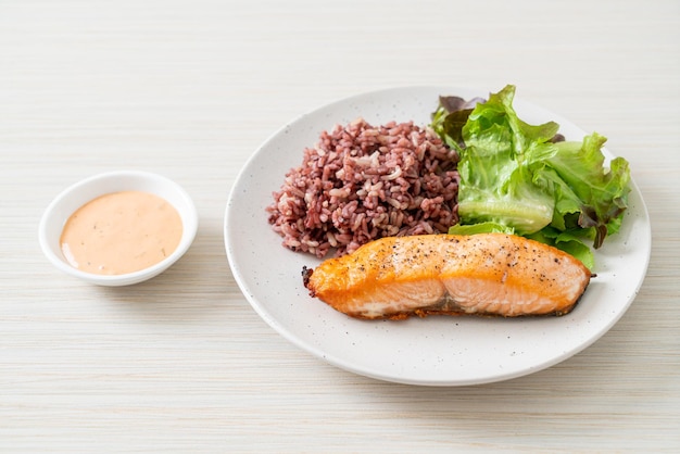 Grilled salmon fillet steak with rice berry and vegetable -\
healthy food style