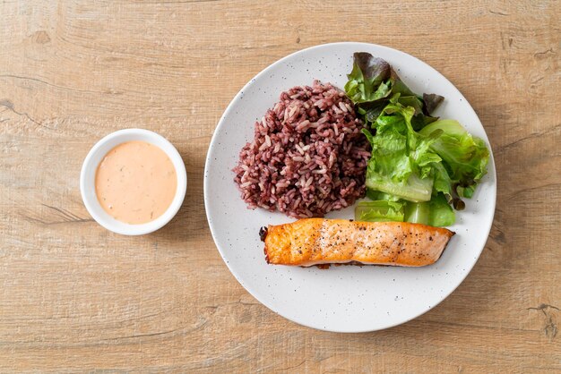 Grilled salmon fillet steak with rice berry and vegetable -\
healthy food style