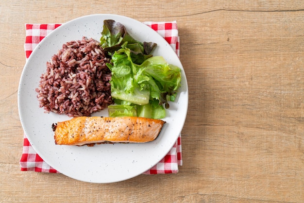 Grilled salmon fillet steak with rice berry and vegetable -\
healthy food style