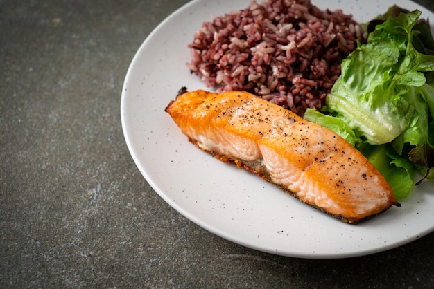 Grilled salmon fillet steak with rice berry and vegetable -\
healthy food style