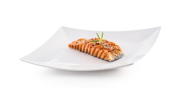 Grilled salmon fillet with sesame herb and pepper isolated on white background.