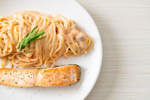 grilled salmon fillet with spaghetti creamy tomato sauce