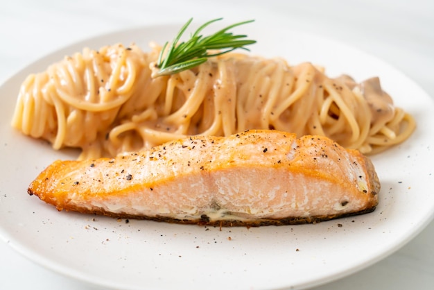 grilled salmon fillet with spaghetti creamy tomato sauce